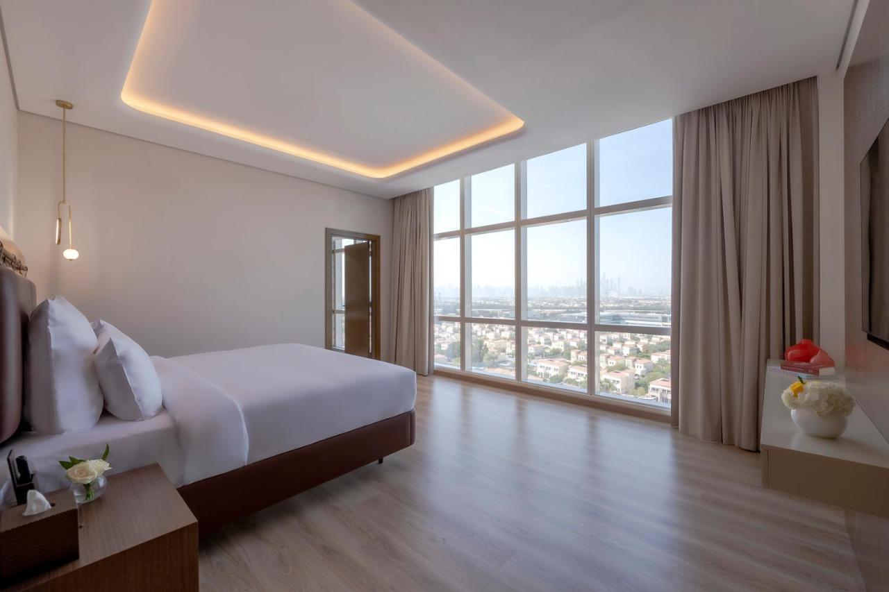 Movenpick Jumeirah Village Triangle Dubai Exterior foto Suite bedroom